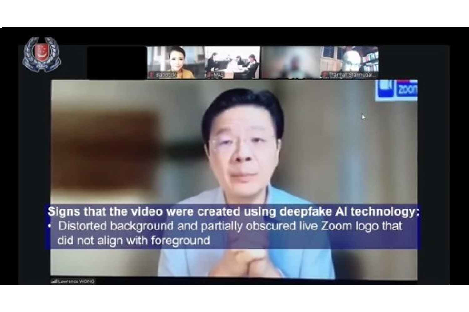 Police-released screenshot of a fake Zoom meeting using a deepfake of PM Lawrence Wong, with deepfake signs annotated